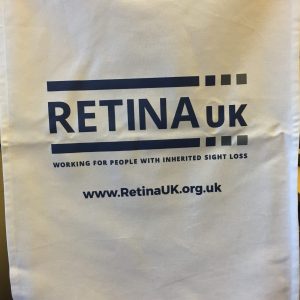 White tea towel with blue Retina UK logo