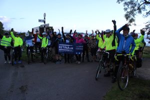 Group shot at the start with arms in the air